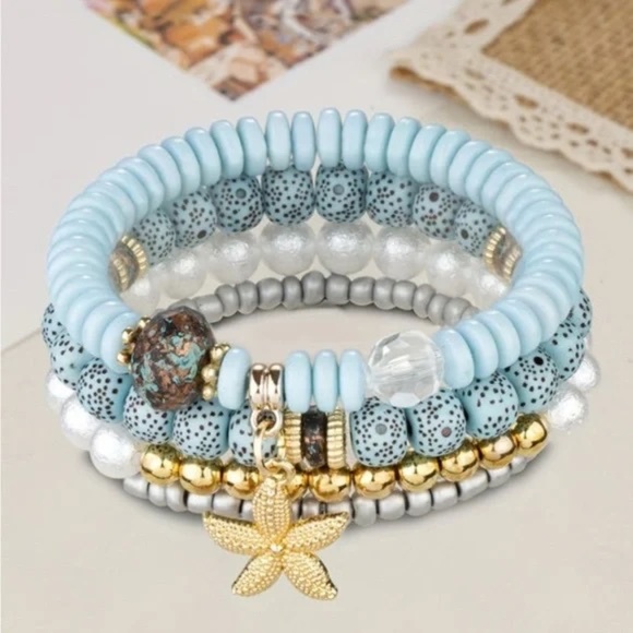 Elegant Beaded Bracelet with Starfish Charm - Picture 1 of 5